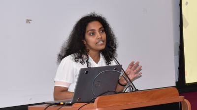 Chrishma Perera at a recent presentation speaking to an audience