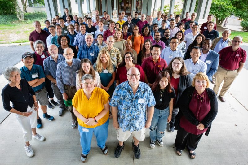 Group photo of the computer science faculty and staff outside.